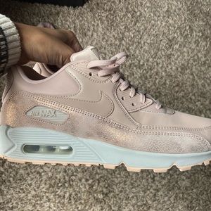 A pair of Nike Air Maxs in Blush Pink size 8.5